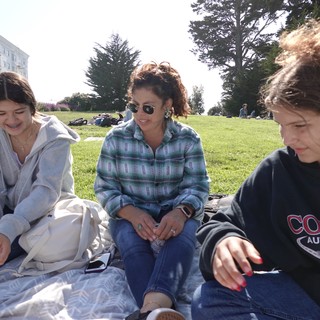 Friends Enjoying Sunny Afternoon Park Picnic