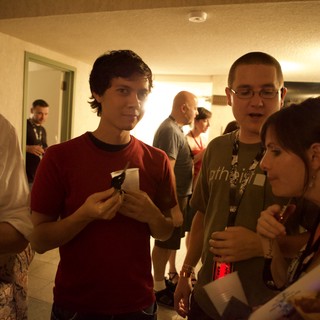 Attendees Mingle in Hallway at DEF CON 17