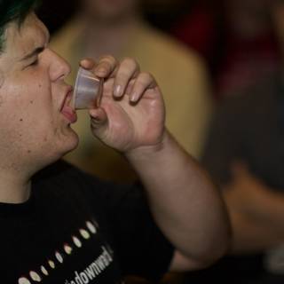 Green-haired Man Quenches his Thirst