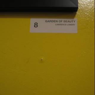 Garden of Beauty Sign on Building Wall