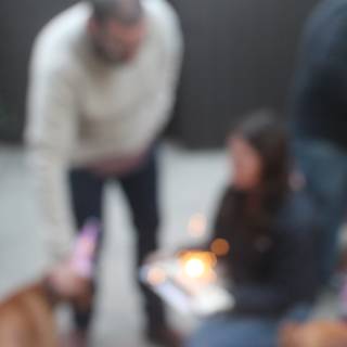 Blurry Portrait of Couple with Their Furry Friend