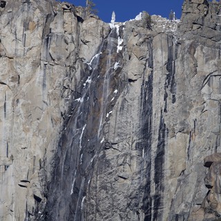 Dramatic Ice-Streaked Granite Cliff Face in Yosemite