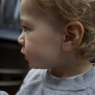 Young Child in Profile with Blonde Curls