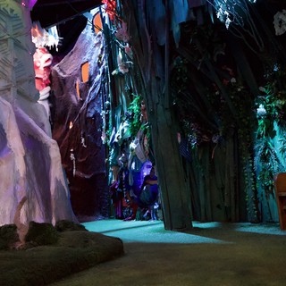 Enchanted Underground Cavern with Colorful Light Installation