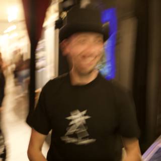Blurry Man in a Hat