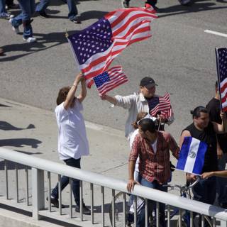Mayday Rally Group Holds American Flags