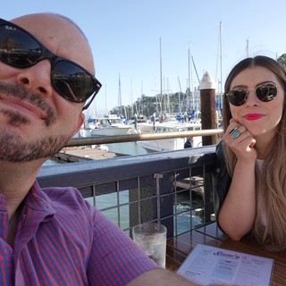 Couple Dining at Waterfront Marina Restaurant
