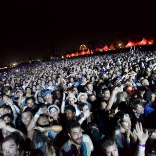 Crowd Jamming to the Concert Under the Night Sky at Cochella 2010