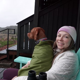 Cozy Outdoor Moment with Dog on Deck