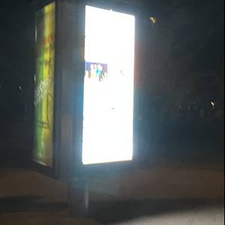 Nighttime Bus Stop Sign