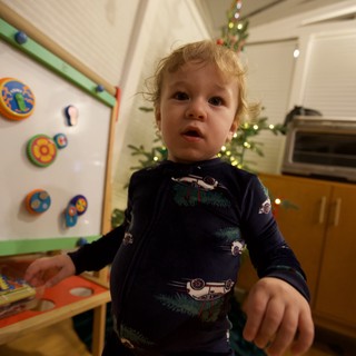Toddler's Curious Christmas Morning in Kitchen