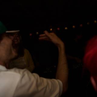 Red-Headed Man Grooving at Urban Night Club
