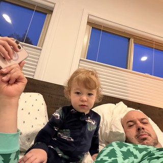 Cozy Family Moment: Father and Toddler in Bedroom