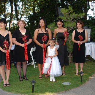 Bridesmaids and Flower Girl Pose at Outdoor Wedding