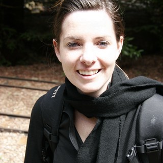 Smiling Hiker Outdoors in Forest Setting