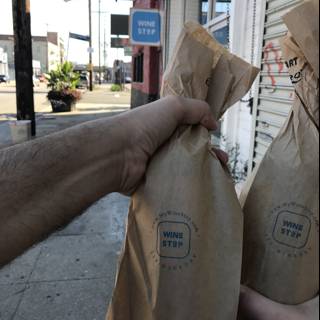 Sidewalk Shopping with Brown Bags