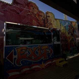 Colorful Food Truck Parked Next to Mural
