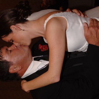 Bride and Groom Share First Wedding Kiss