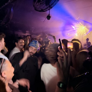 Vibrant Club Night Under Disco Ball Lights