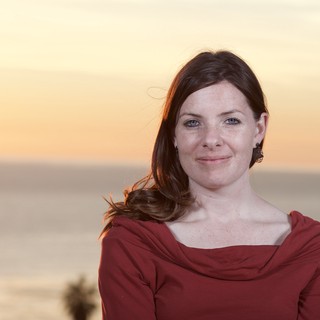 Woman in Red at Golden Hour Beach Sunset