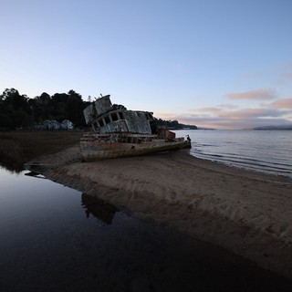 Abandoned Shipwreck at Twilight on California Coast