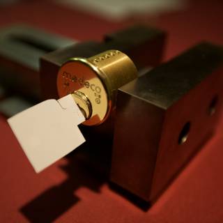 Gold Lock with Paper Tag