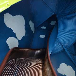 Looking Down a Whimsical Playground Slide in Fantasyland