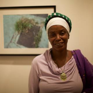 Turban-wearing Woman Smiling for the Camera