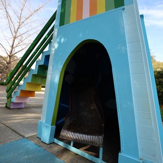 Colorful Rainbow Slide Tunnel at Playground