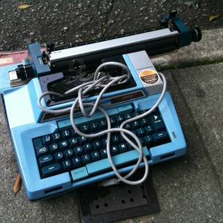 Vintage Blue Typewriter with Cord