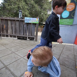 Children Exploring Interactive Outdoor Science Exhibit