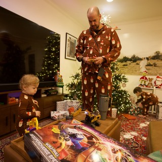 Father and Child's Matching Pajamas Christmas Morning