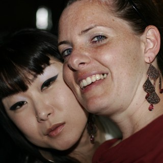 Two Women Share a Close Friendly Moment