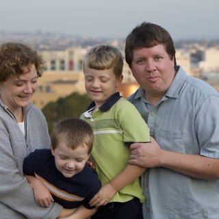 Family Portrait on Rooftop at Dusk