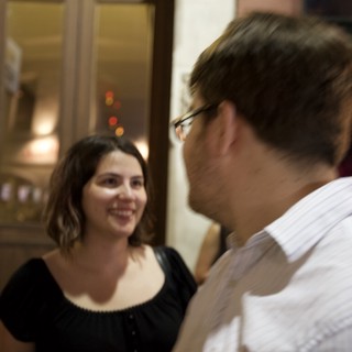 Two People Sharing a Warm Moment at Night