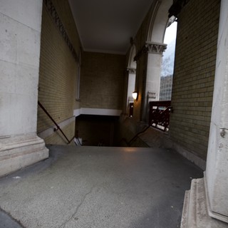 Covered Pedestrian Bridge Between Classical Buildings