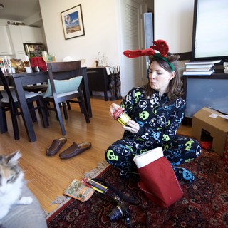 Christmas Morning Stocking Surprises in Reindeer Pajamas