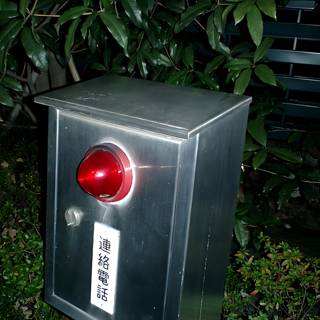 Red Light on a Metal Box