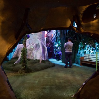 Cave-Like Museum Installation with Colorful Crystal Displays