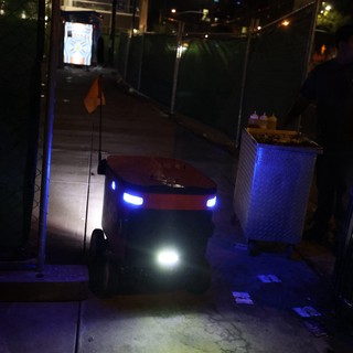 Autonomous Delivery Robot Navigates Nighttime Festival Sidewalk