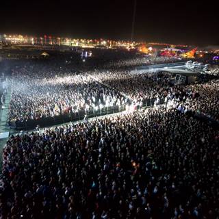 Coachella's Night Sky Illuminated by Concert Crowd