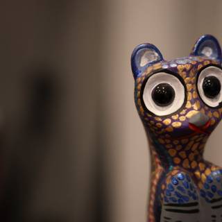 Adorable Cat Figurine with Big Eyes