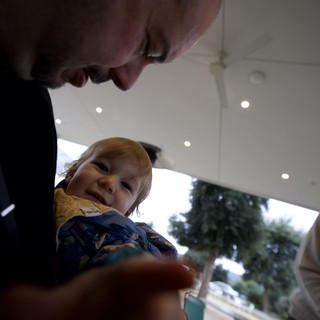 Father and Child Sharing a Joyful Moment Indoors