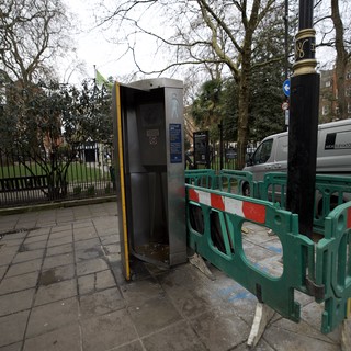Urban Public Toilet Facility with Construction Barriers