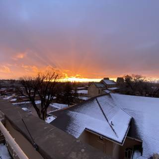 Winter Sunset over a Snowy Santa Fe House