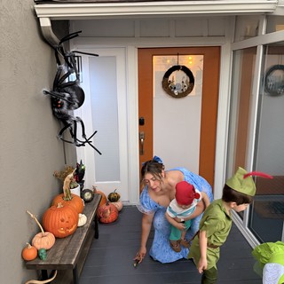 Family Halloween Celebration on Decorated Front Porch