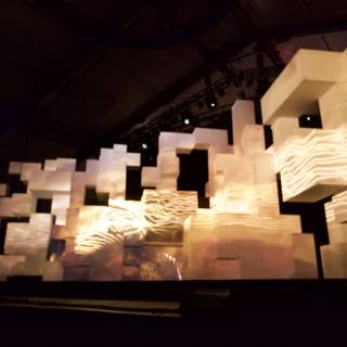 Illuminated Stage with Artistic Sculpture