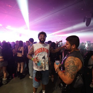 Tattooed Revelers Celebrate at Wobbleland EDM Festival