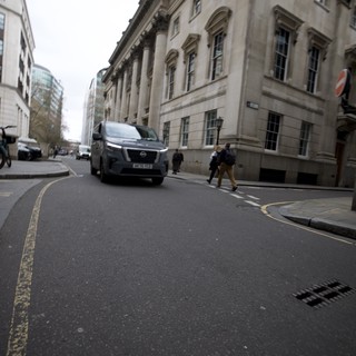 Gray Van on London Street Corner