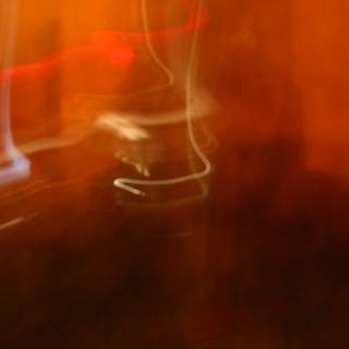 Blurry Figure in Smoke-filled Room